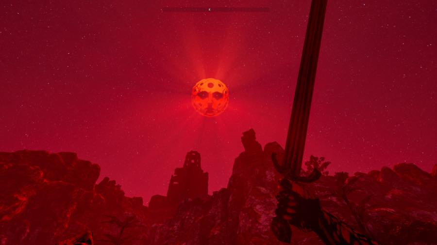 A large red moon with a face in a night sky above rocky terrain