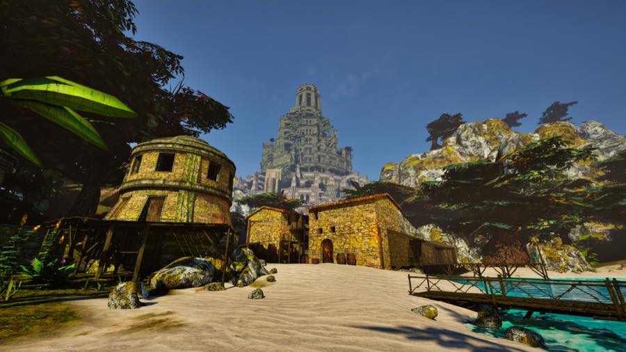 The town of Magdal Rest on the shore, with the Tower rising behind it